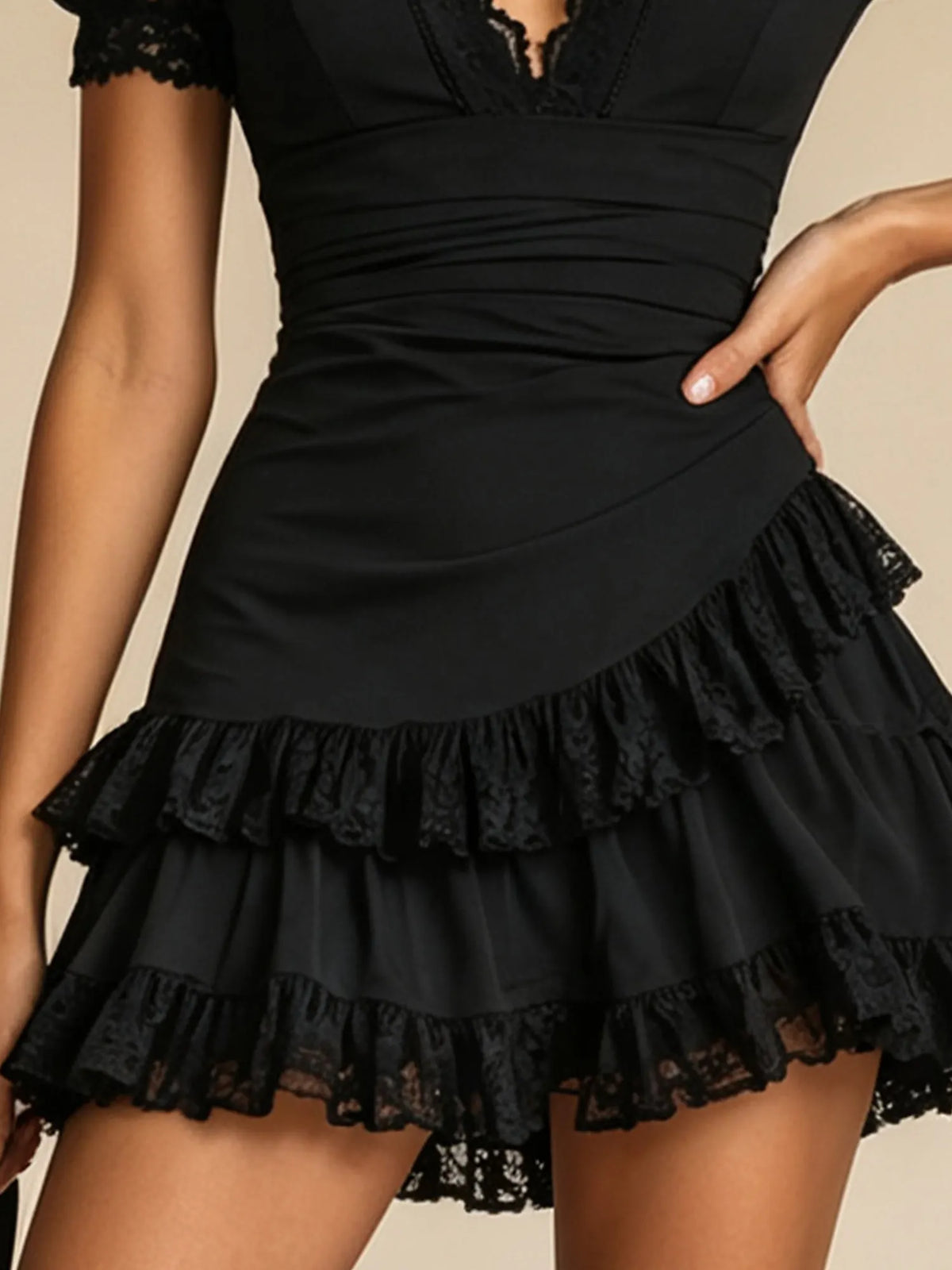 Western-style dress — Dark black, deep V-neck, fitted waist, pleated fabric, and lace trim. Mini Dress