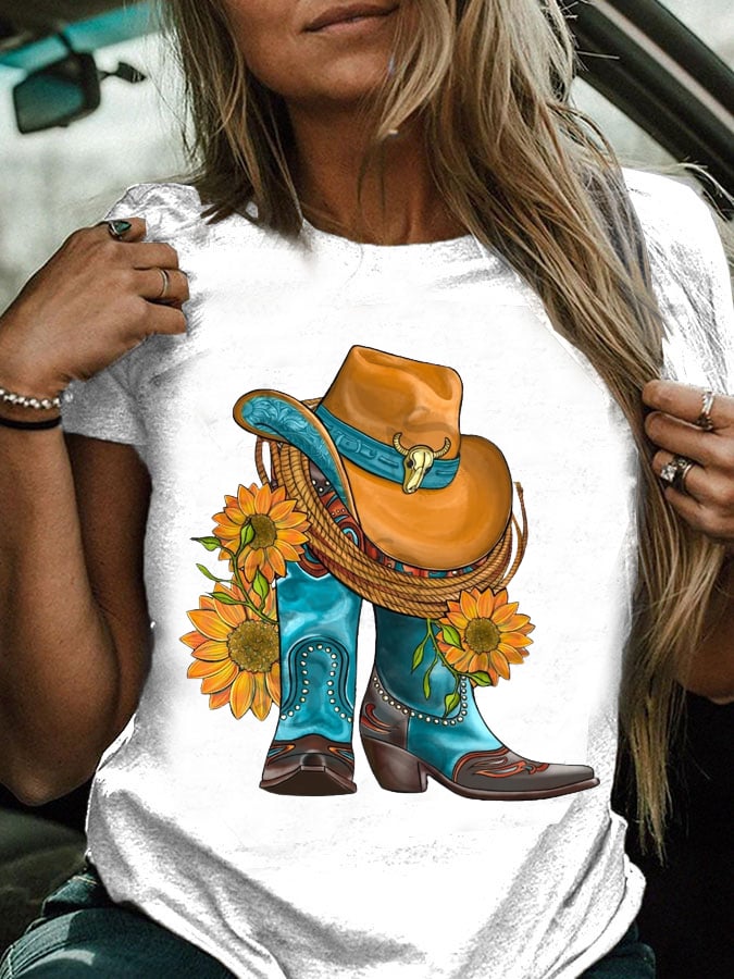 Western hat and cowboy boots paired with a sunflower print T-shirt